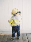 Toddler boy painting wall — Stock Photo
