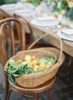 Basket with fresh citrus fruits — Stock Photo