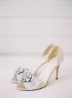 Bridal high-heeled shoes with gems — Stock Photo