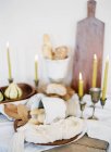 Decorated set table with candles — Stock Photo