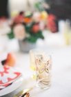 Ornamental glass on setting table — Stock Photo