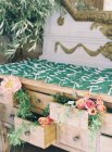 Vintage dresser decorated with flowers — Stock Photo
