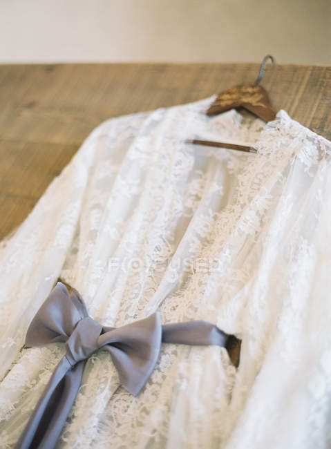 Wedding dress with silk belt — Stock Photo