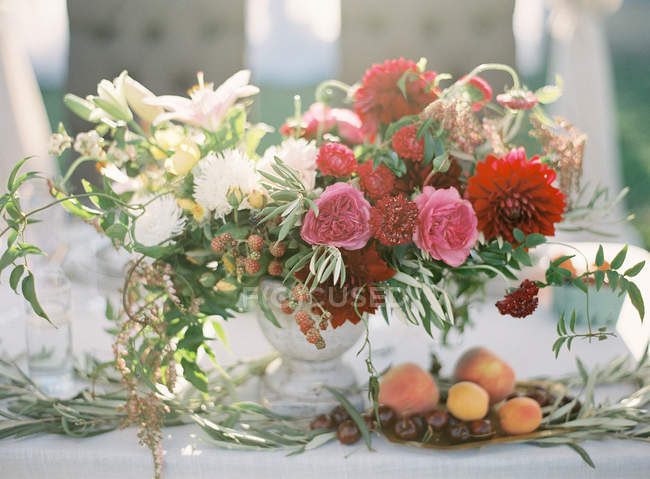 Wedding table decorated with flowers — Stock Photo