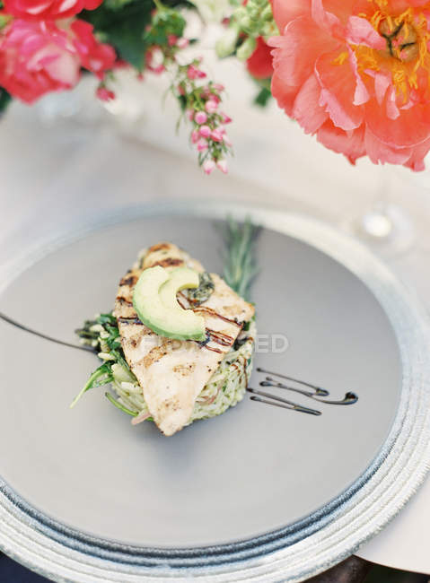 Risotto with avocado on plate — Stock Photo