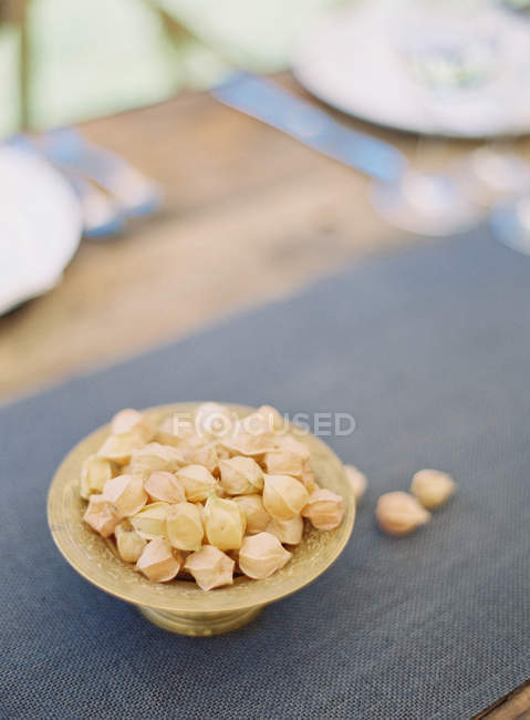 Cape gooseberry flowers in bowl — Stock Photo
