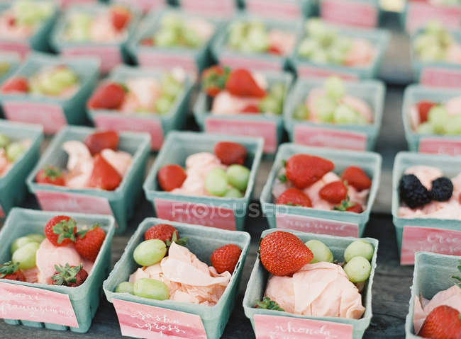 Carton boxes with fresh berries — Stock Photo