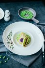 Risotto of green peas with pikeperch — Stock Photo