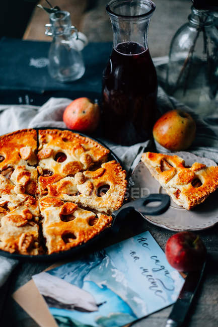 Apple pie on rustic wooden table — Stock Photo
