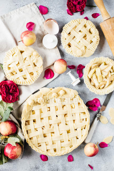 Homemade apple pies being made — Stock Photo