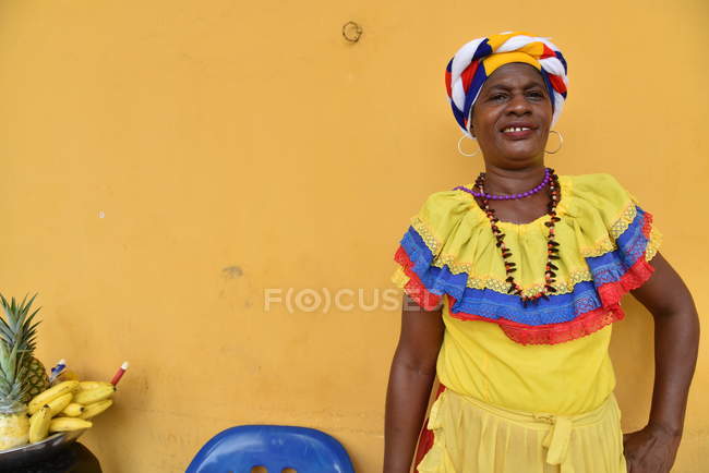 Lady in national outfit smiling — Stock Photo
