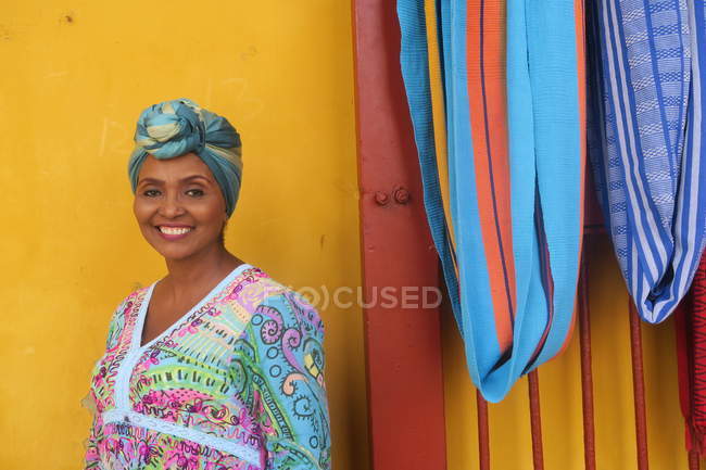 Lady in national outfit smiling — Stock Photo