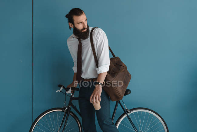 Businessman cyclist — Stock Photo