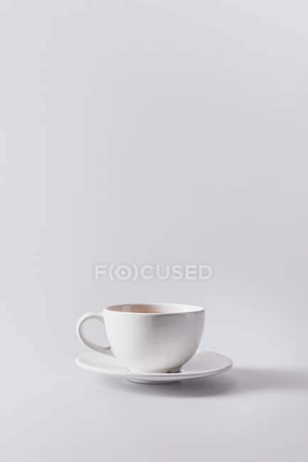 White coffee cup on saucer — Stock Photo