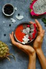 Fruit soup with dragon fruits and almonds — Stock Photo