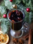 Glass with hot mulled wine — Stock Photo