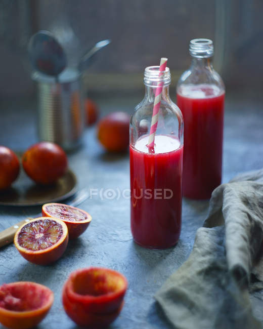 Two bottles of sicilian orange juice — Stock Photo