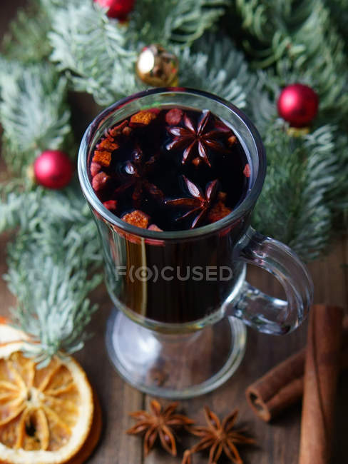 Glass with hot mulled wine — Stock Photo