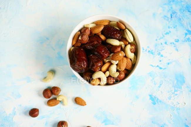 Dates and different nuts — Stock Photo