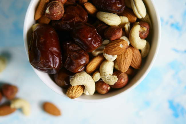 Dates and different nuts — Stock Photo