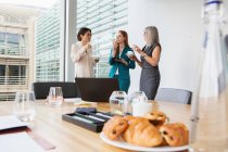 Businesswomen at breakfast meeting — Stock Photo