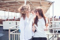 Tourist friends on passenger ferry deck — Stock Photo