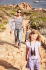 Mother walking with children — Stock Photo