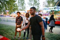 Group of friends at funfair — Stock Photo