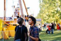 Two male friends at funfair — Stock Photo