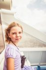 Portrait of young girl on boat — Stock Photo