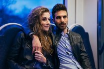 Couple travelling in train — Stock Photo