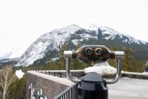 Coin operated binoculars by mountain — Stock Photo