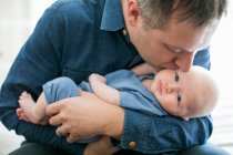 Father holding baby boy — Stock Photo