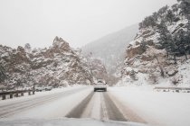 Truck on snow covered road — Stock Photo