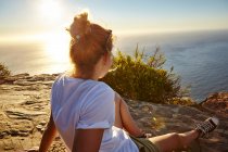 Woman relaxing looking at view — Stock Photo