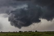 Rotating cloud over rural area — Stock Photo