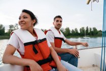 Man and woman on sailing boat — Stock Photo