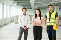 Portrait of three workers — Stock Photo