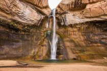 Waterfall through rock formation — Stock Photo