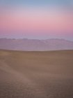 Pôr do sol sobre dunas de areia planas Mesquite — Fotografia de Stock