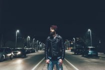 Hipster on city street looking away — Stock Photo