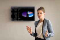 Businesswoman explaining during office presentation — Stock Photo
