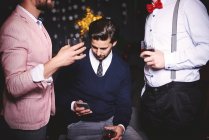 Три чоловіки на вечірці — стокове фото