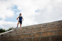 Man standing at top of steps — Stock Photo