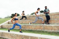 Women working out with personal trainer — Stock Photo