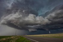 Rotating clouds over rural area — Stock Photo