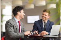 Two businessmen meeting in boardroom — Stock Photo