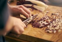Chef slicing salad — Stock Photo