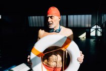Senior man on lifeguard duty — Stock Photo
