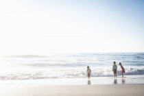 Brothers and sister on beach — Stock Photo